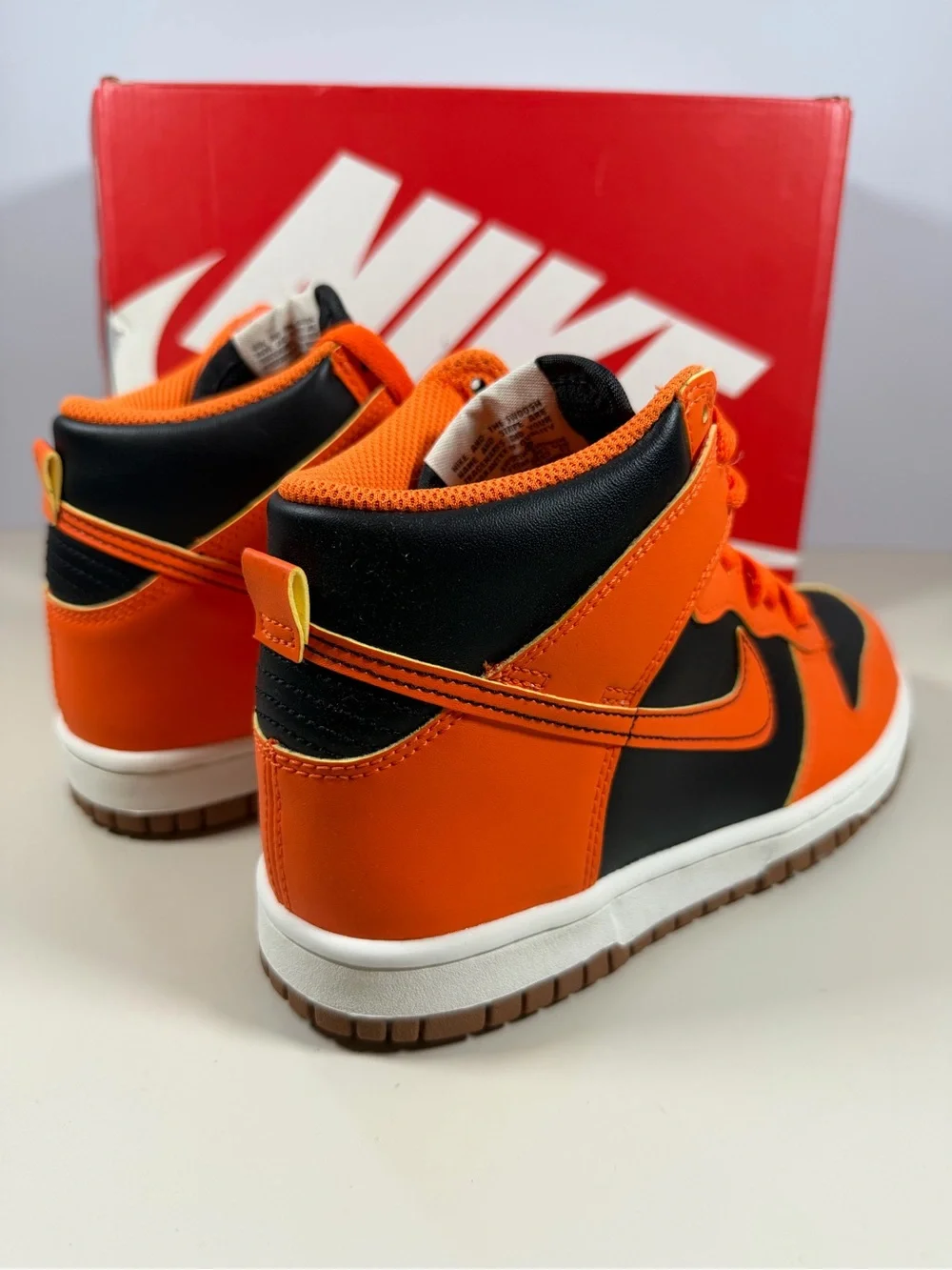 Nike Kids High-Top Sneakers in Orange and Black